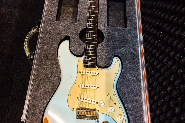 Guitar case foam insert cut to a Fender Stratocaster body
